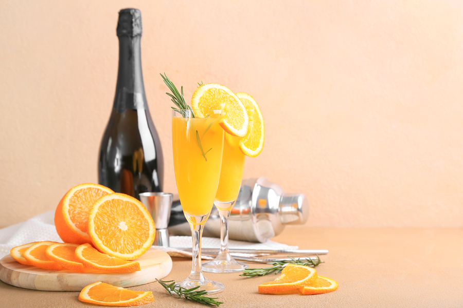 how much champagne goes in a mimosa